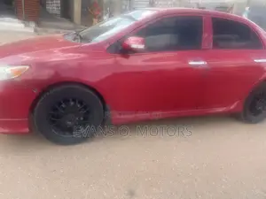 Toyota Corolla Base 4dr Sedan (1.8L 4cyl 5M) 2010 Red