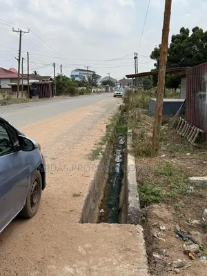 Roadside 100x100ft Land for Sale at Agbogba Academic City