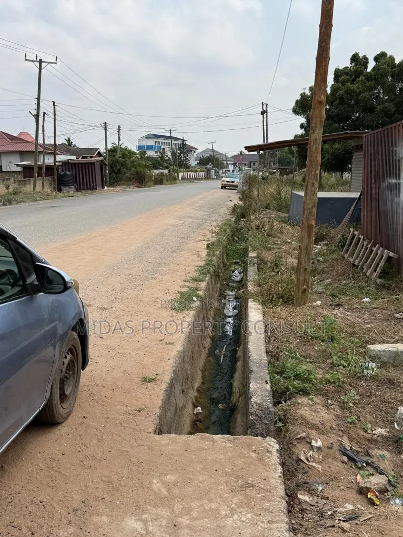 Roadside 100x100ft Land for Sale at Agbogba Academic City