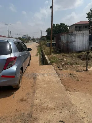 Roadside 100x100ft Land for Sale at Agbogba Academic City