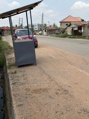 Roadside 100x100ft Land for Sale at Agbogba Academic City