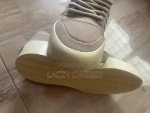 Adidas X Fear of God Athletics '86 Lo Sneakers.