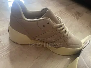 Adidas X Fear of God Athletics '86 Lo Sneakers.