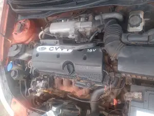 Kia Rio SX 4dr Sedan (1.6L 4cyl 4A) 2010 Orange