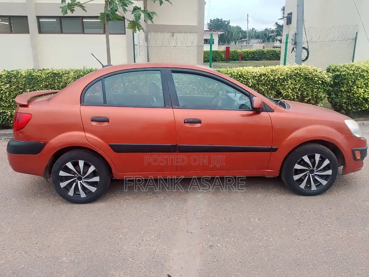Kia Rio SX 4dr Sedan (1.6L 4cyl 4A) 2010 Orange