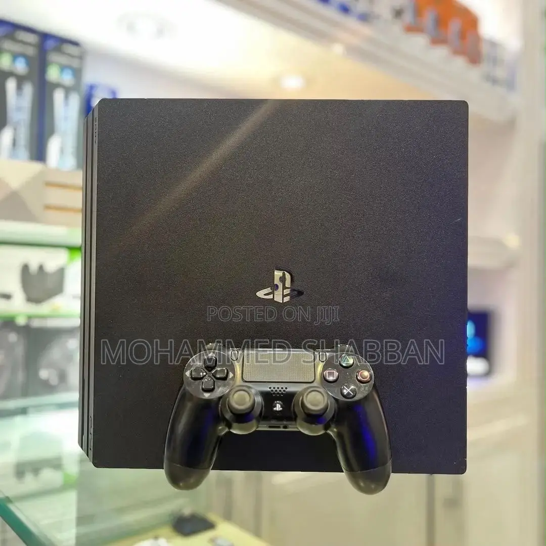 PS4 Pro 1TB With 23 Games . Very Neat .