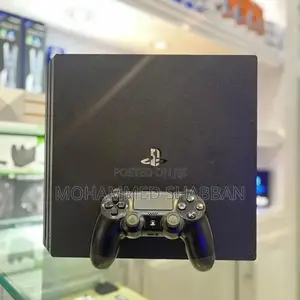 PS4 Pro 1TB With 23 Games . Very Neat .