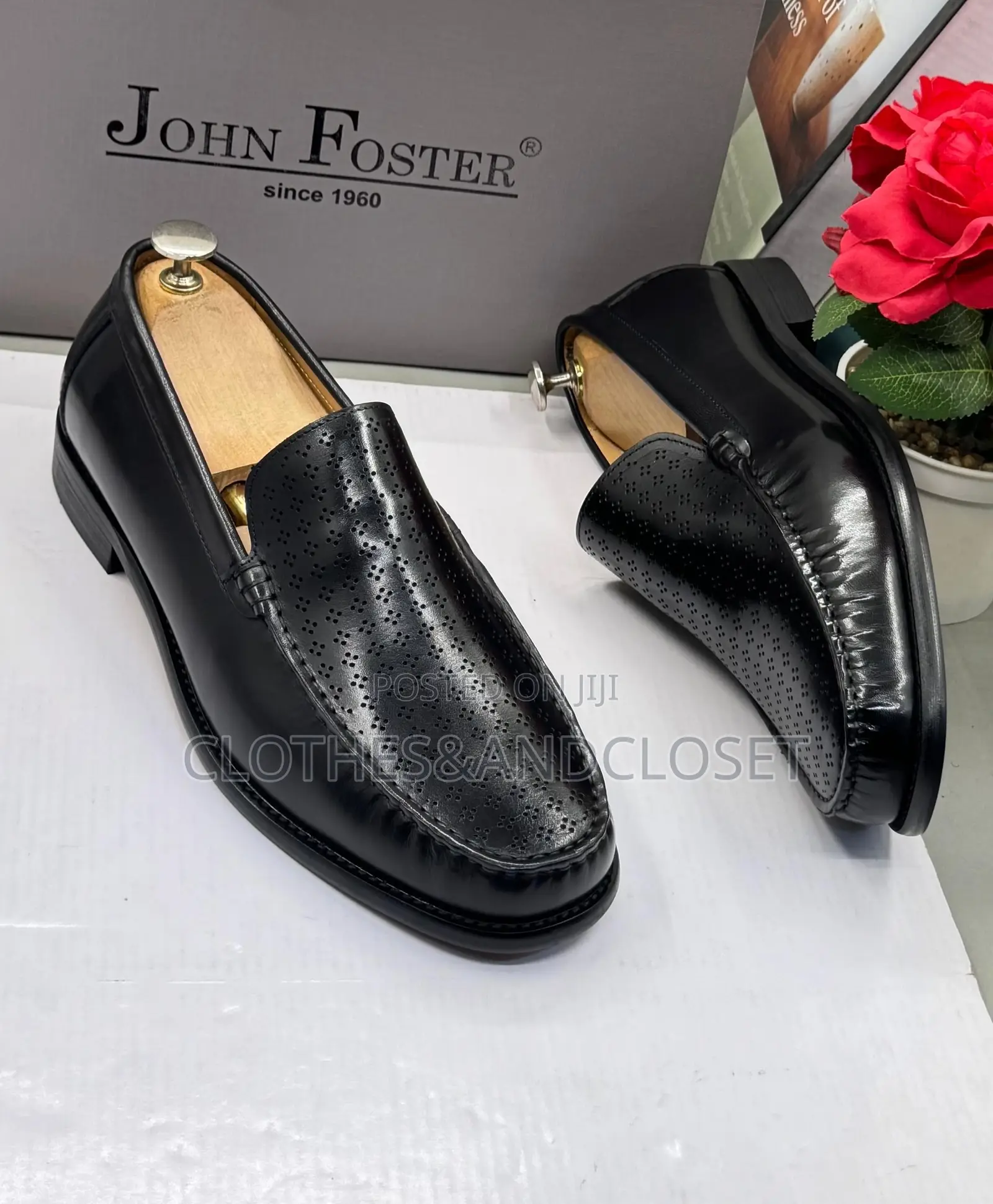 Black Leather Slip-on Dress Loafers Feature a Textured, and a Low Heel
