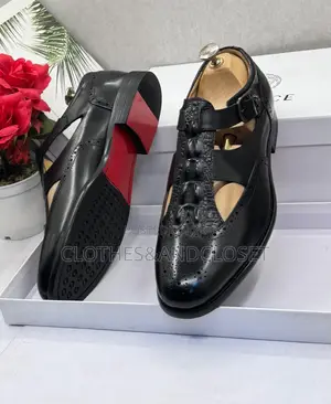 A Pair of Black Men's Brogue Cutout Leather Shoe-Sandals