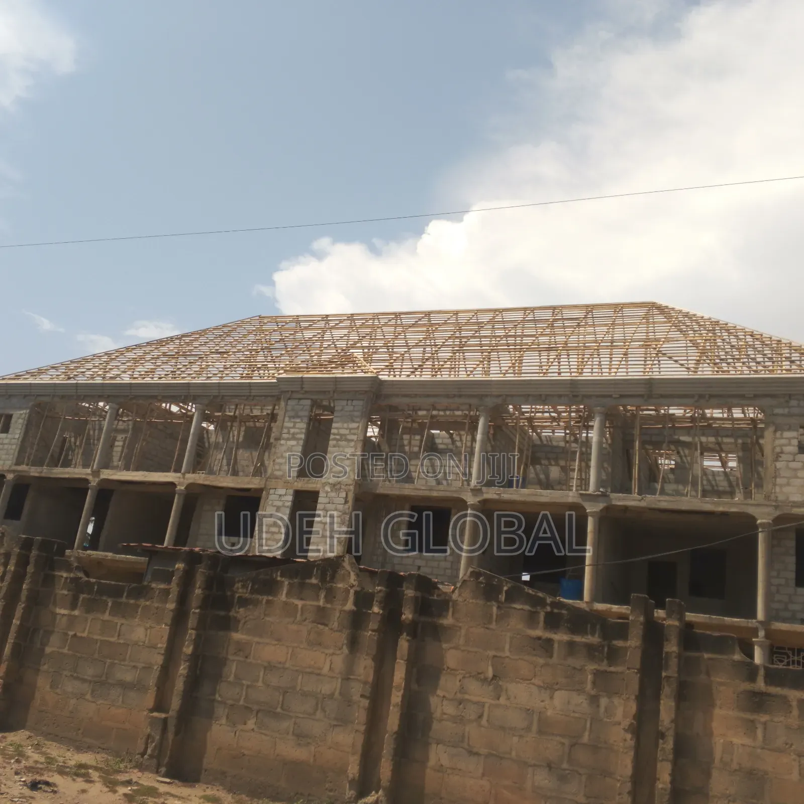 Parapets Wood Work & Metro Tile's Roofing Sheets and Rain Gutters .