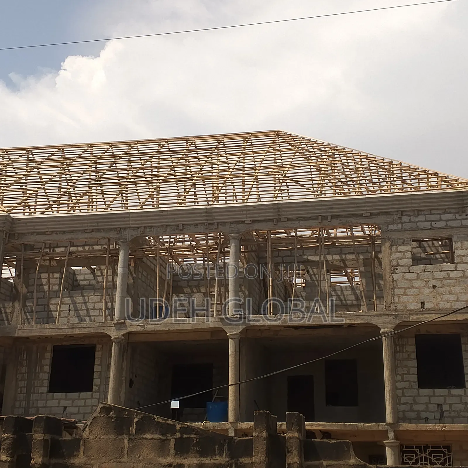 Parapets Wood Work & Metro Tile's Roofing Sheets and Rain Gutters .