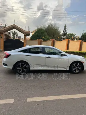 Honda Civic Touring 2dr Coupe (1.5L 4cyl) 2017 Pearl