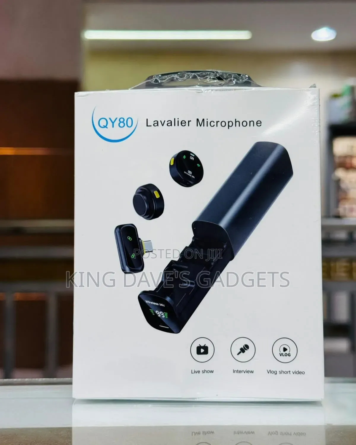 QY80 Wireless Lavalier Microphone Set With a Magnetic Charging Case.