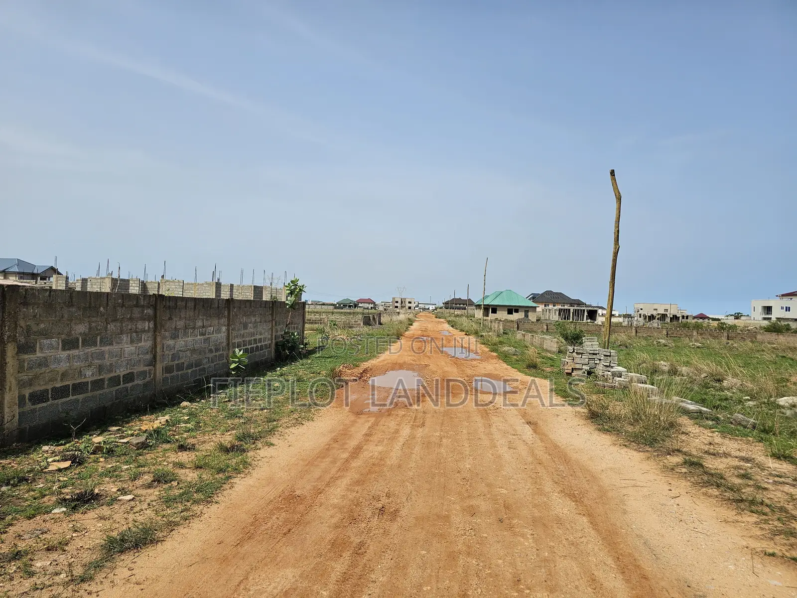 Full Plot (70x100) for Sale at SkyPort City, Tsopoli – No Flooding