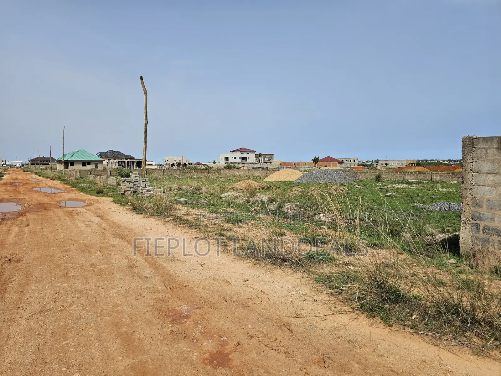 Full Plot (70x100) for Sale at SkyPort City, Tsopoli – No Flooding