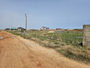 Full Plot (70x100) for Sale at SkyPort City, Tsopoli – No Flooding