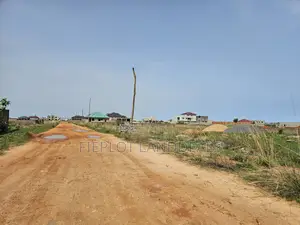 Full Plot (70x100) for Sale at SkyPort City, Tsopoli – No Flooding