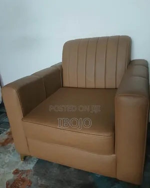 High Density Tan Leather Modern Single-Seater Armchair. Limited Stock