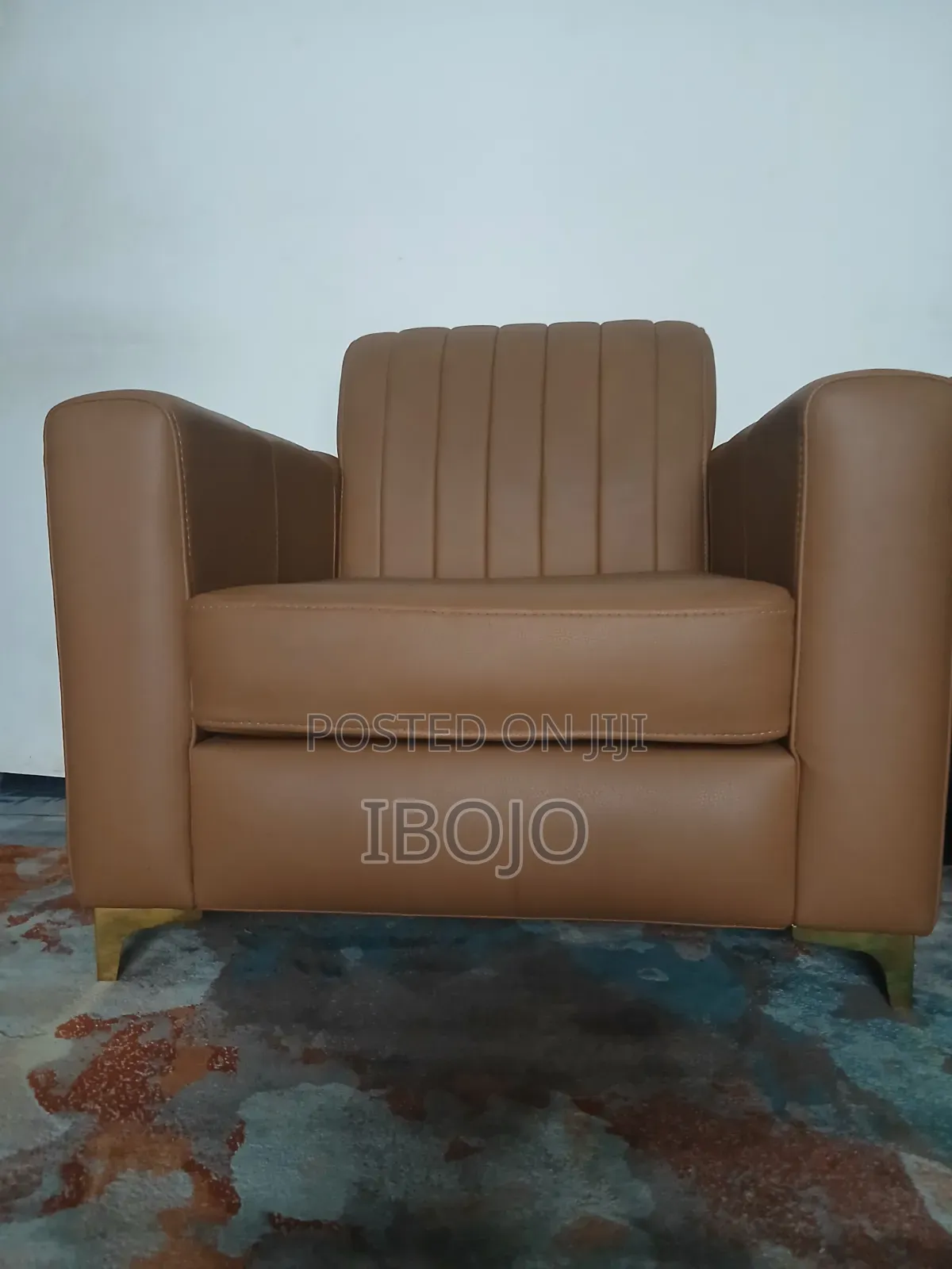 High Density Tan Leather Modern Single-Seater Armchair. Limited Stock