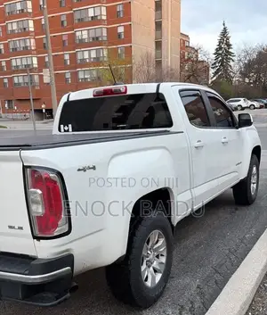 GMC Canyon SLT 4dr Crew Cab SB (2.5L 4cyl 6A) 2015 White