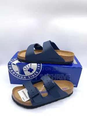 Blue Birkenstock Arizona Two-Strap Sandals With Cork Footbeds,