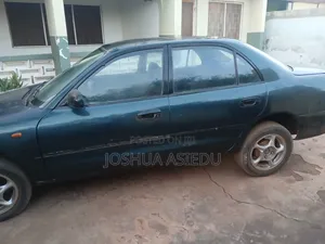 Mitsubishi Mirage 2009 Green