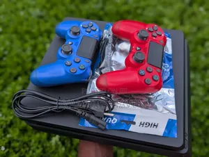 PS4 Slim With 2 Controllers and 7 Games of Your Choice