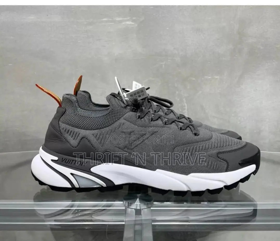 Grey and White Louis Vuitton LV Tatic Knit Sneaker.