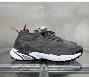 Grey and White Louis Vuitton LV Tatic Knit Sneaker.