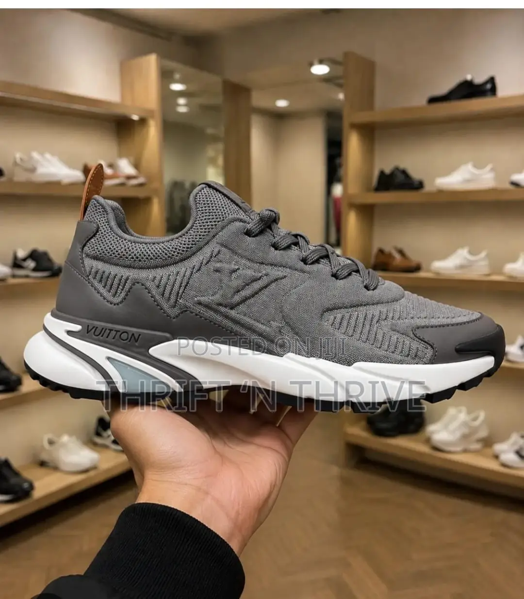 Grey and White Louis Vuitton LV Tatic Knit Sneaker.
