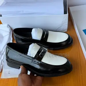 Black and White Prada Penny Loafers