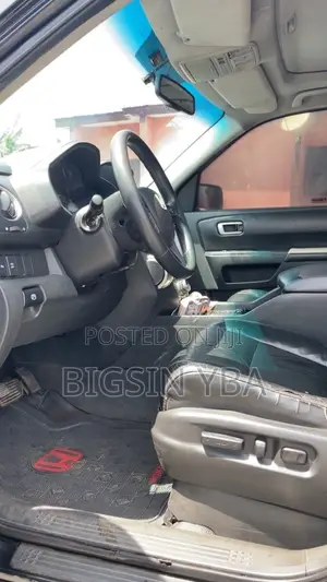 Honda Pilot Touring w/RES/Navi 4WD (3.5L 6cyl 5A) 2012 Black