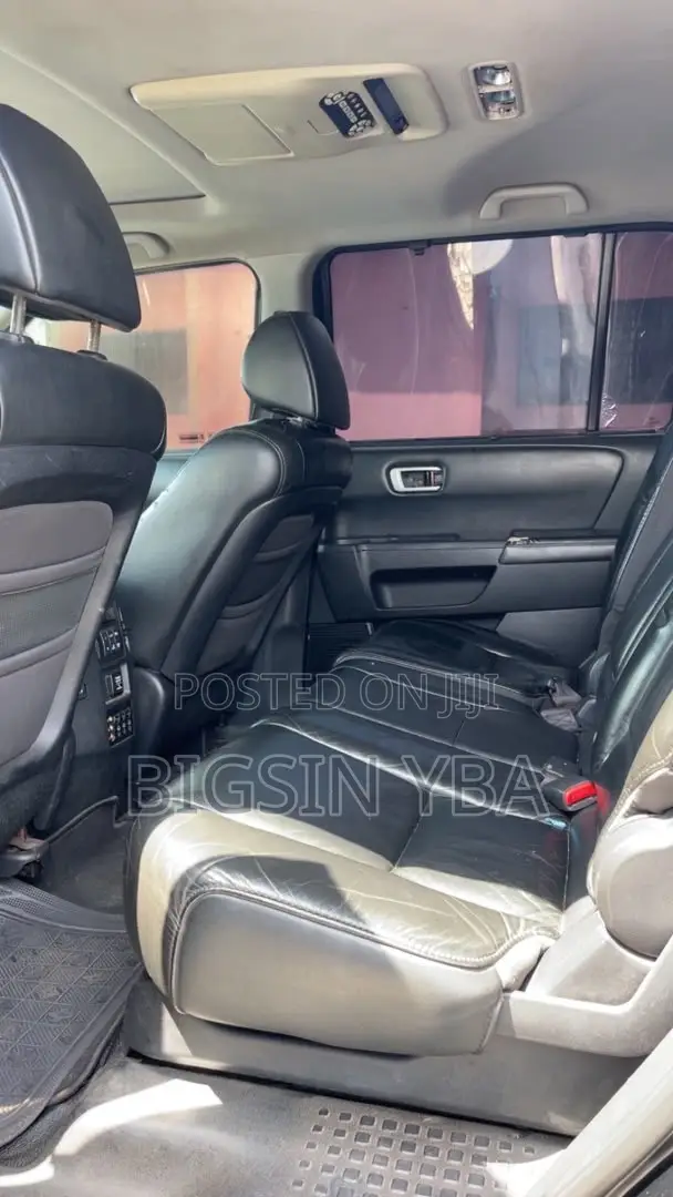 Honda Pilot Touring w/RES/Navi 4WD (3.5L 6cyl 5A) 2012 Black