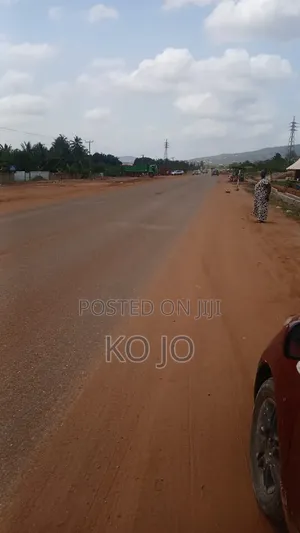 3 Plots of Titled Roadside Land at Dodowa