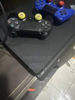PS4 Slim With Two Controllers