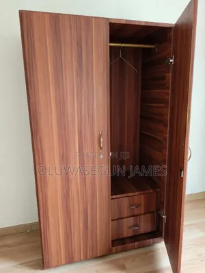 Neatly Used 2-Door Wooden Wardrobe With Mirror and Drawers - Takoradi