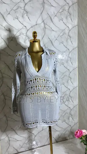 A Chic White Crochet Mini Dress