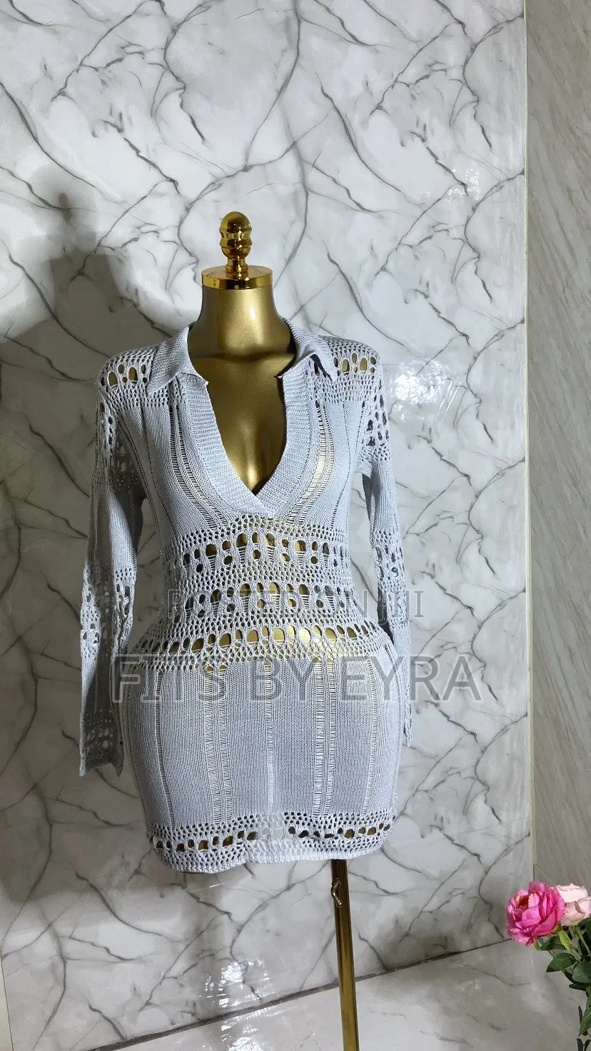 A Chic White Crochet Mini Dress
