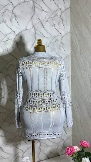 A Chic White Crochet Mini Dress