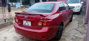 Toyota Corolla LE 4dr Sedan (1.8L 4cyl 4A) 2010 Red