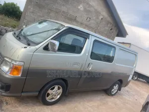 Nissan Caravan (Urvan) 2014 Brown