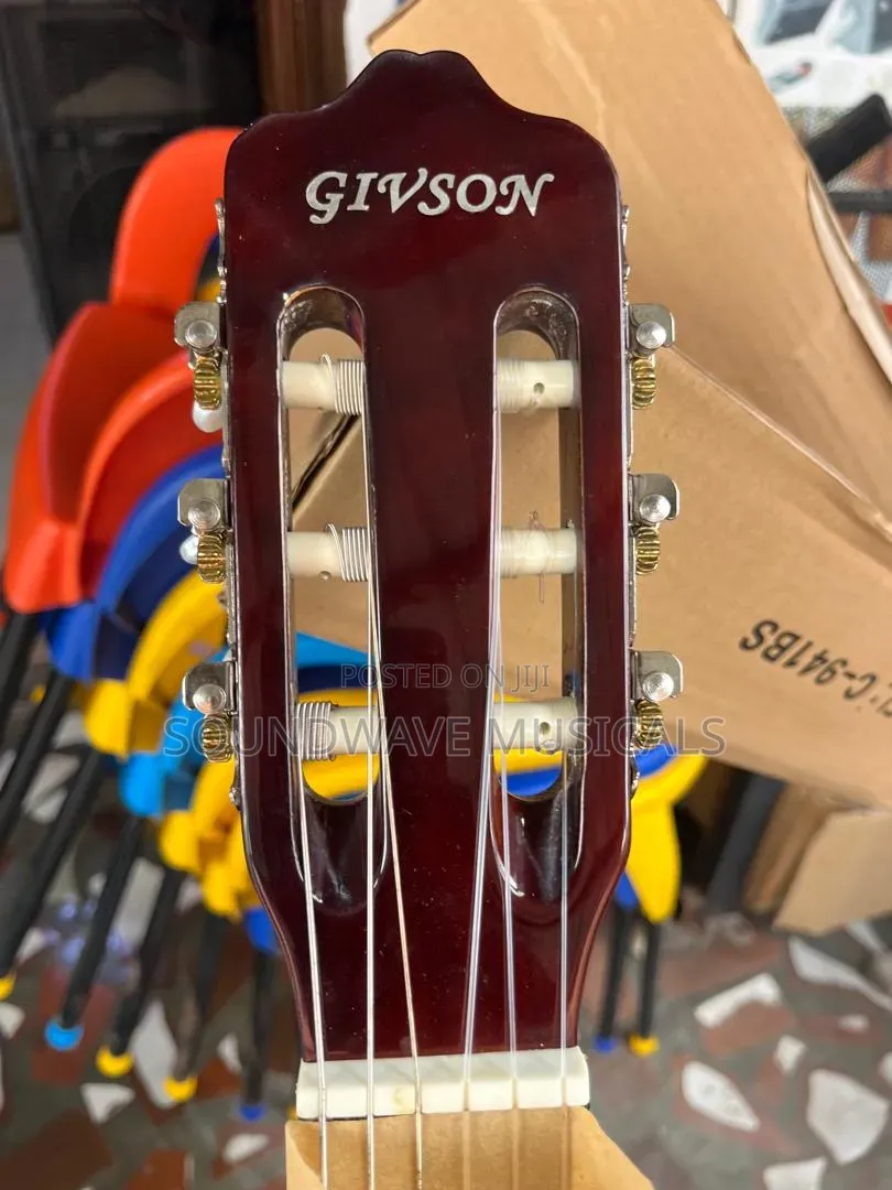 Givson Acoustic Guitar (Nylon Brown Color)