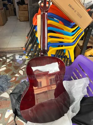 Givson Acoustic Guitar (Nylon Brown Color)