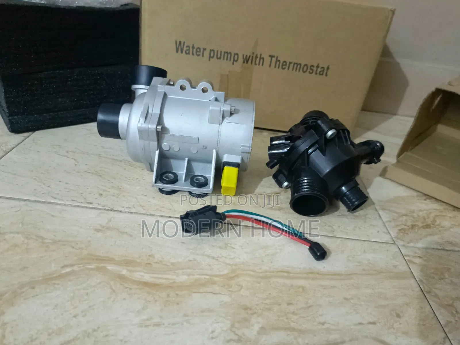BMW 2.0L Water Pump With Thermostat