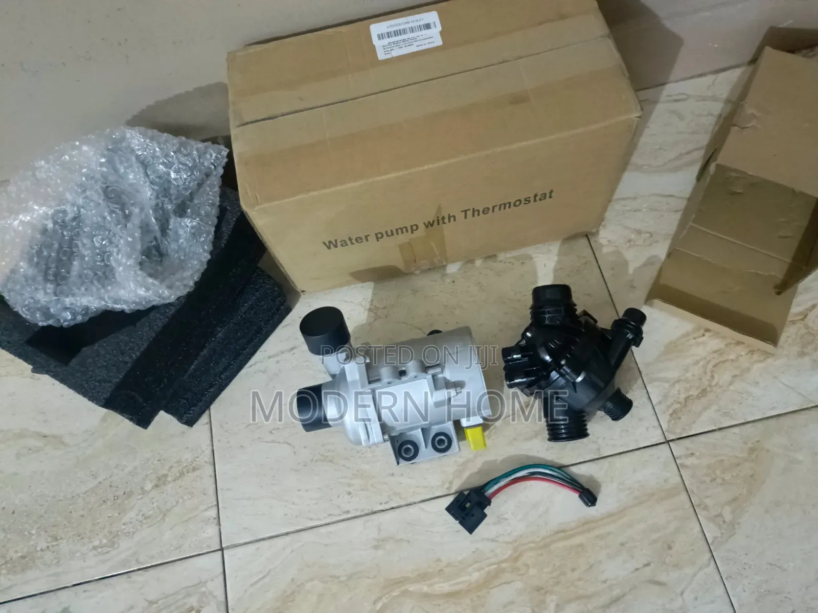 BMW 2.0L Water Pump With Thermostat