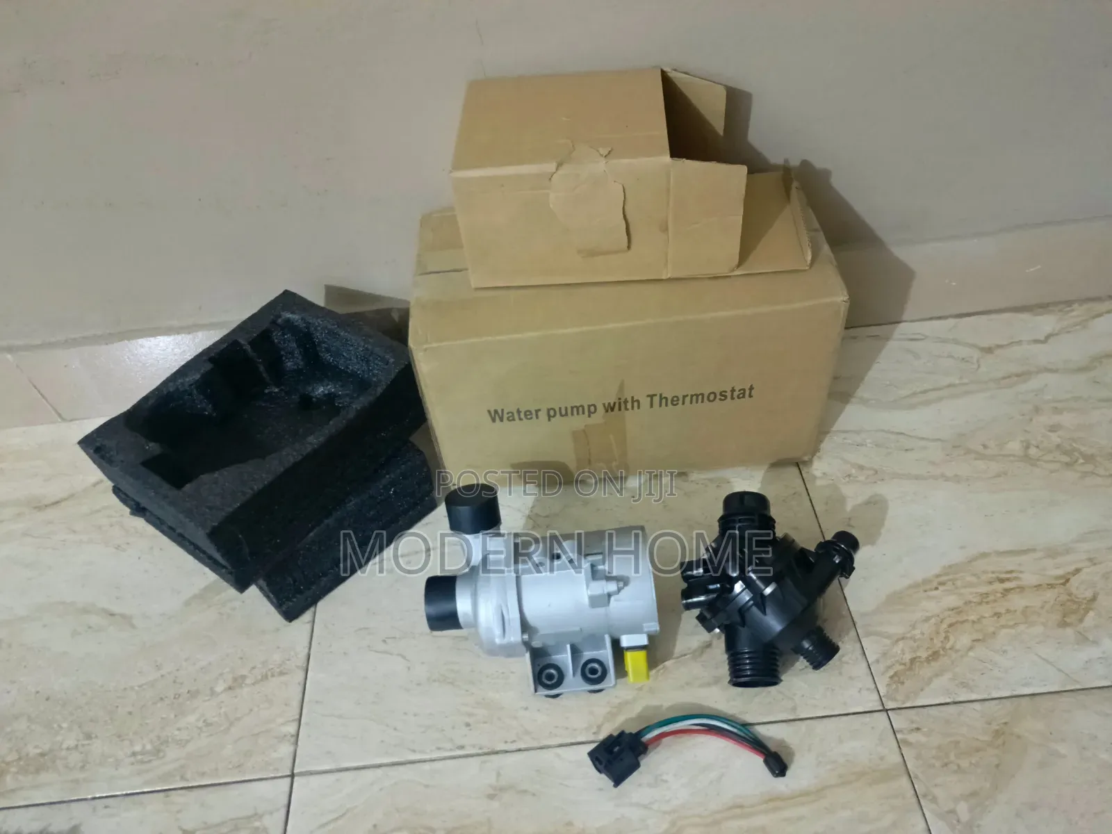 BMW 2.0L Water Pump With Thermostat