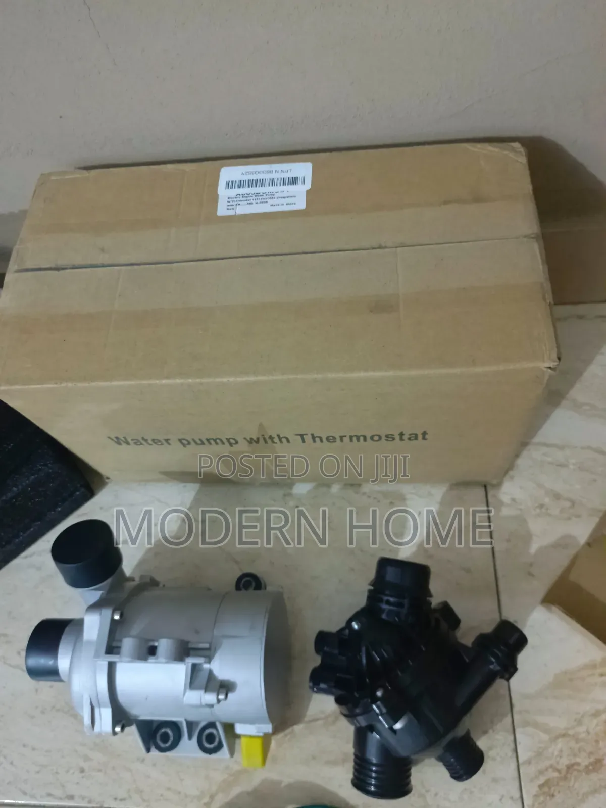 BMW 2.0L Water Pump With Thermostat