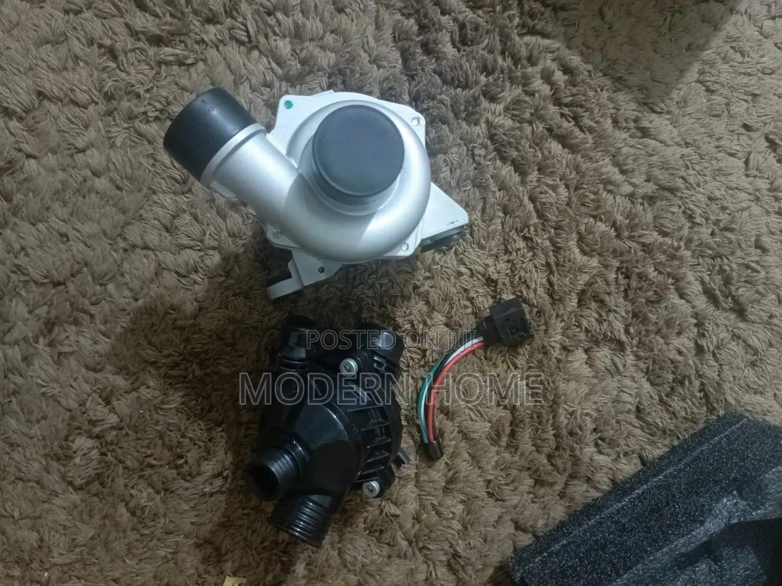 BMW 2.0L Water Pump With Thermostat