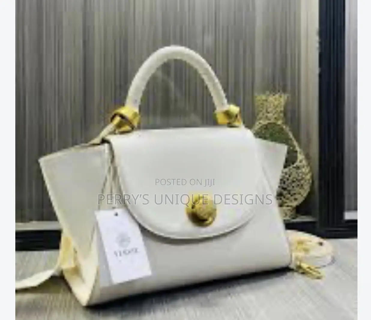 Luxury Versse Winged Leather Handbag With Crossbody Strap – Off-White
