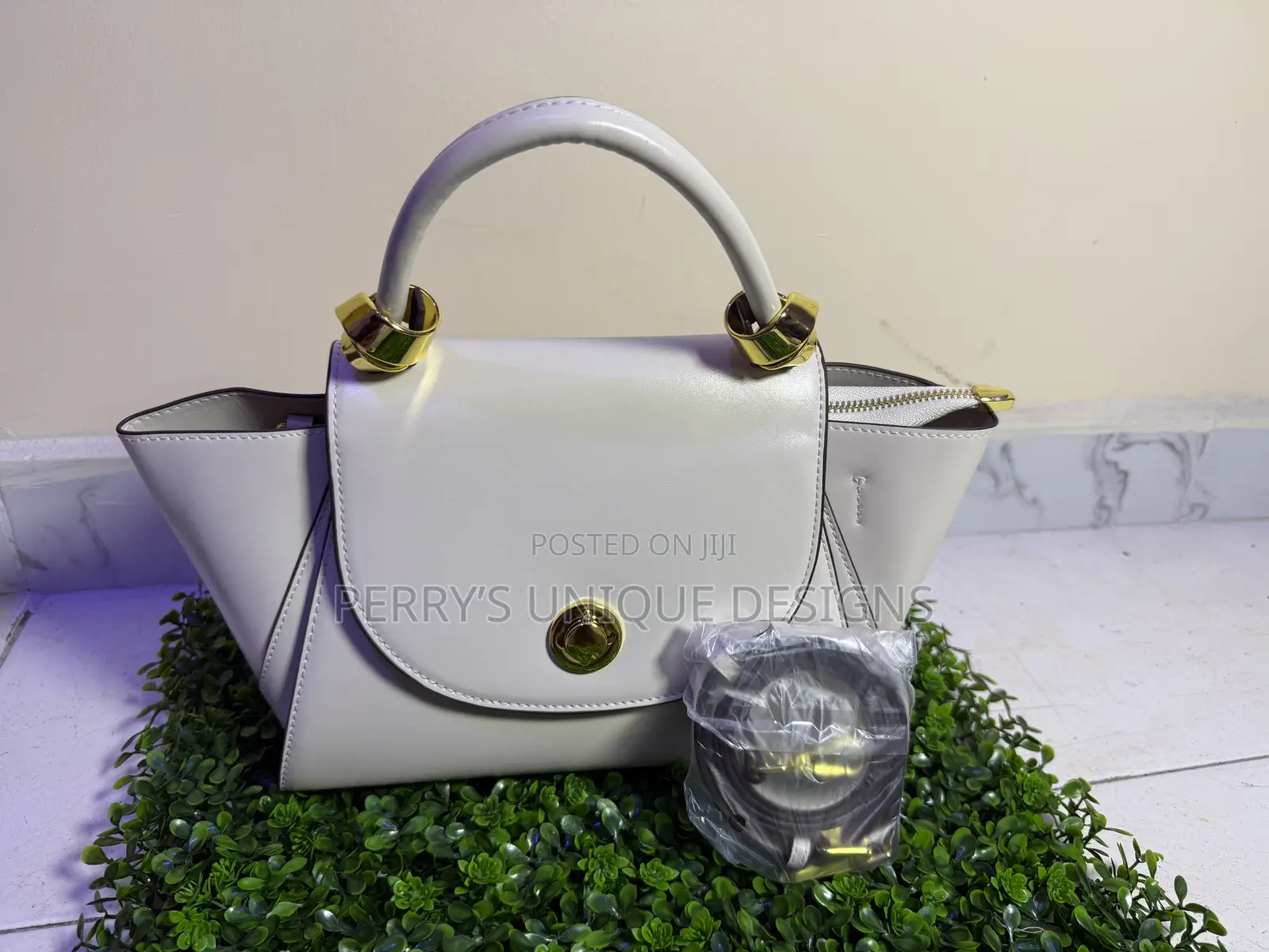 Luxury Versse Winged Leather Handbag With Crossbody Strap – Off-White